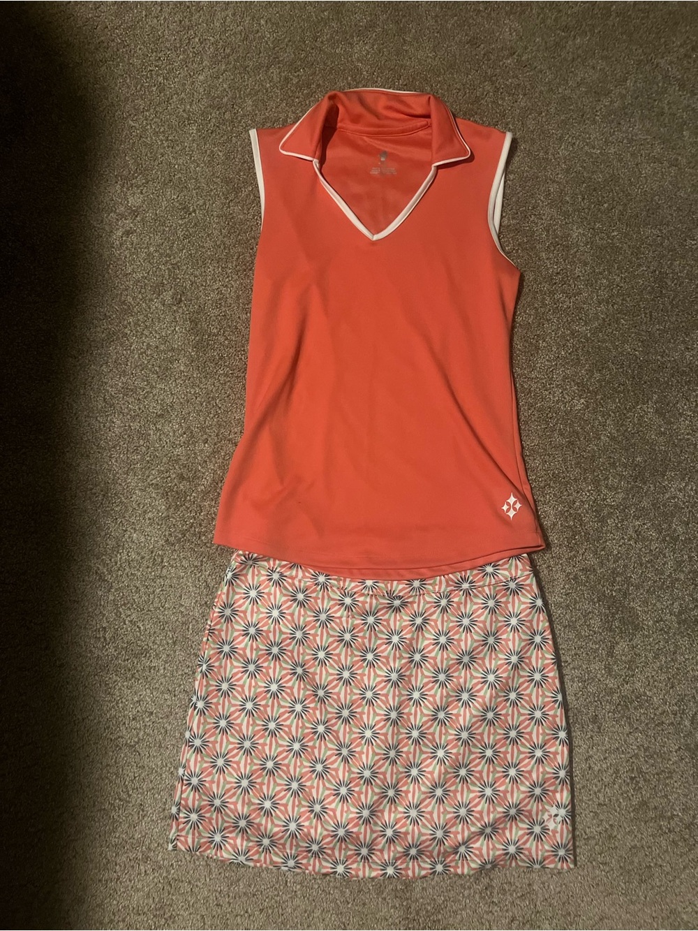 ALL by Jofit Coral Sleeveless Polo & Coral/White Geometric Golf Skirt Set